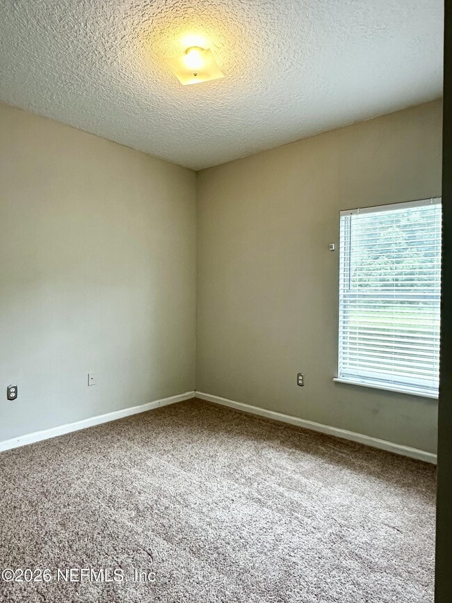 Building Photo - 6985 Ortega Woods Dr