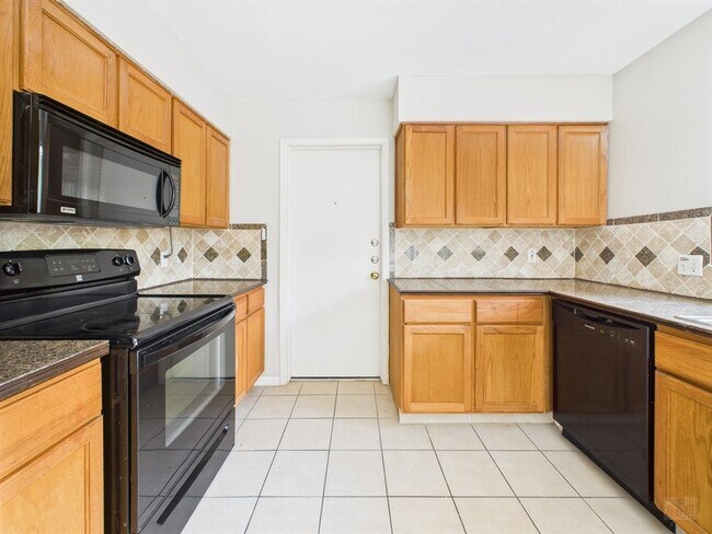 Building Photo - 9520 Quail Village Ln