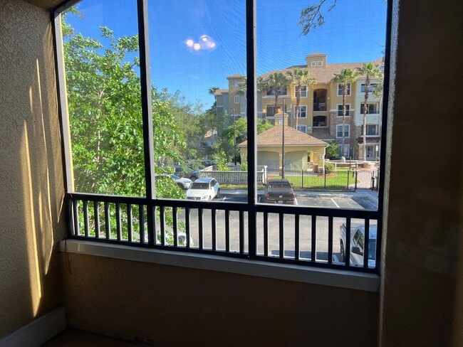 Building Photo - Spacious 3BR/2BA Gated Condo with Resort-Style Amenities!