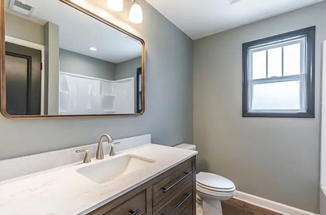 Building Photo - Fully Renovated 2BR/2BA with Garage – Walk to West Sixth & Legacy Trail