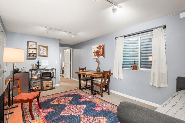 Building Photo - Prime Location | Spacious 4BD Home with El...