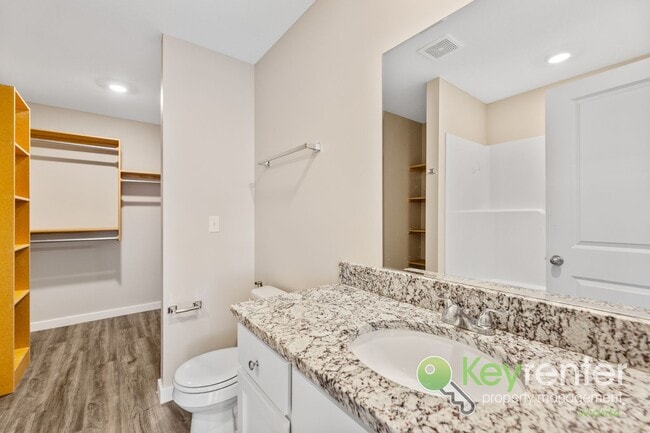 Building Photo - E 69th Ct N Duplex