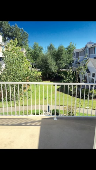 Back patio facing courtyard. - 6123 S 232nd St