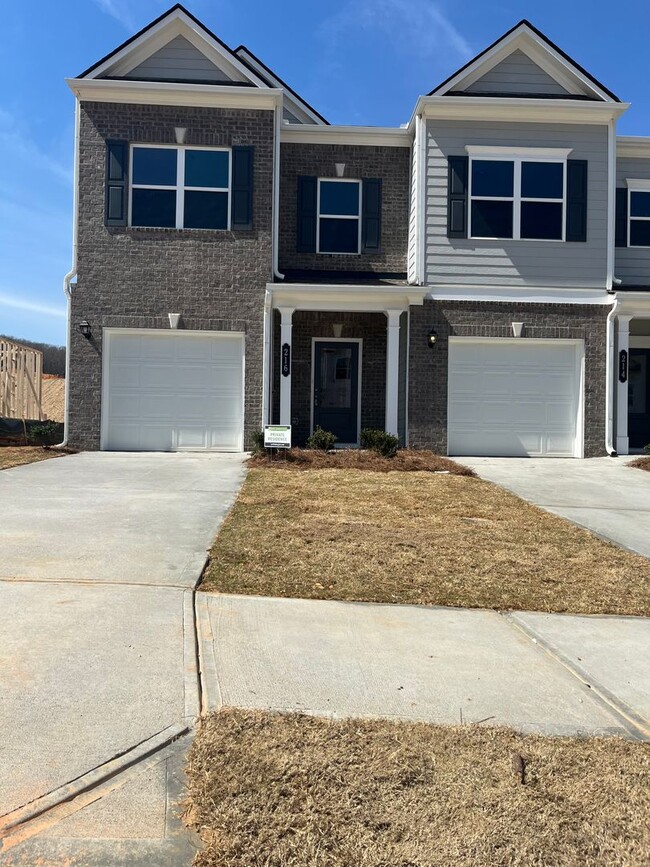 Building Photo - Beautiful Newly Constructed 3/.25 Townhome!