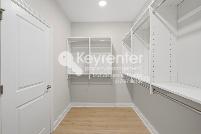 Building Photo - Located in Westfield, IN, this attractive 3-bedroom, 2.5-bath home sits on a corner lot within an...