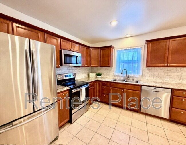 Building Photo - 5502 S Owasso Ave