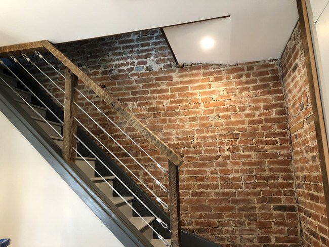 Exposed Brick Throughout house - 1599 Washington St