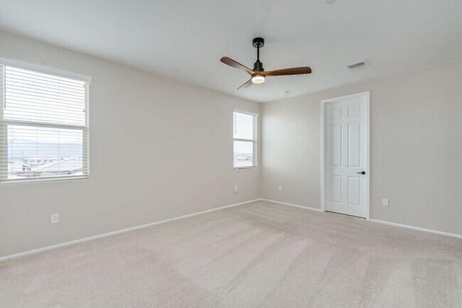 Building Photo - Amazing 4BR 2.5BA Home w/ 3-Car Tandem Garage • Pool Access • Yard w/ Fire Pit in Saguaro Trails