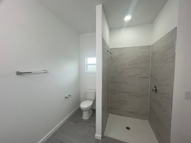 Building Photo - Brand-New 4BR/2BA Luxury Home with 2-Car Garage – Desirable 33971 Location