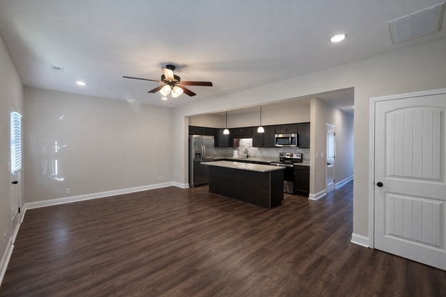 Building Photo - $250 OFF Move In Special! - Modern 3 Bedroom Townhome in Prime Location