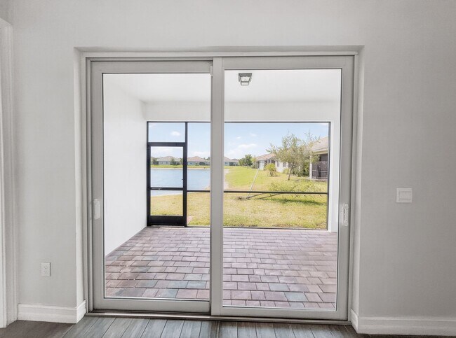 Building Photo - Live the Southwest Florida lifestyle in this lakefront villa in South Naples!