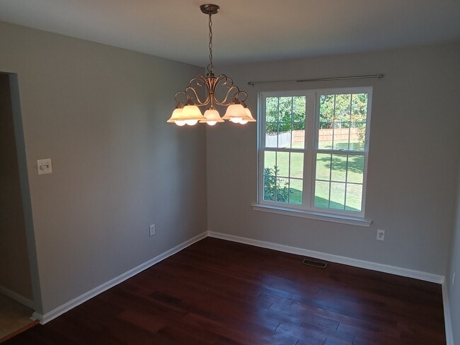 Building Photo - This charming 1,732-square-foot single-family home offers 3 bedrooms and 3 bathrooms, featuring a...