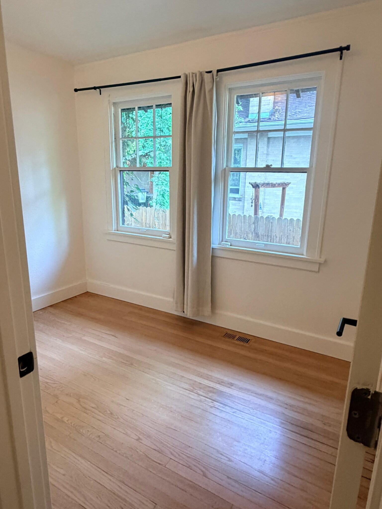 Cozy north facing second bedroom, also gets great sunlight - 1235 S University Blvd