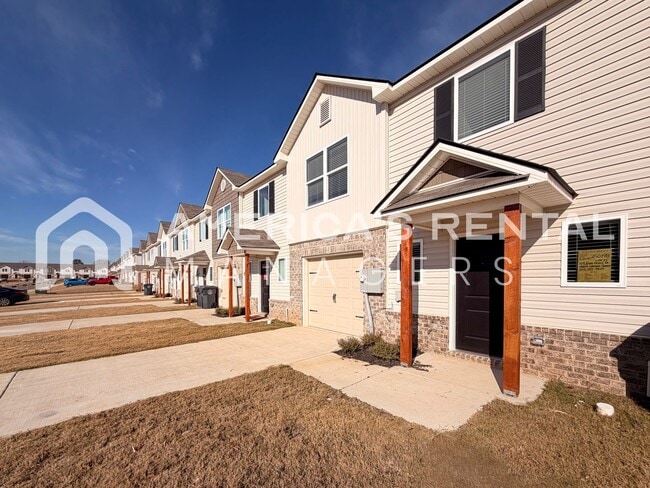 Building Photo - Spacious Two-Story Townhome with Open Layout!