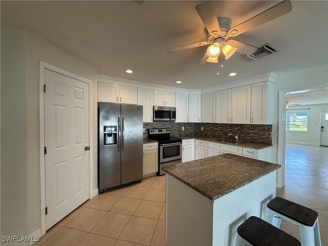 Building Photo - 6677 Fiesta Way