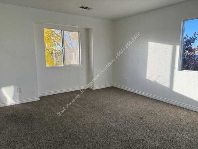 Building Photo - New Year Special! 50% Off First Month's Rent!