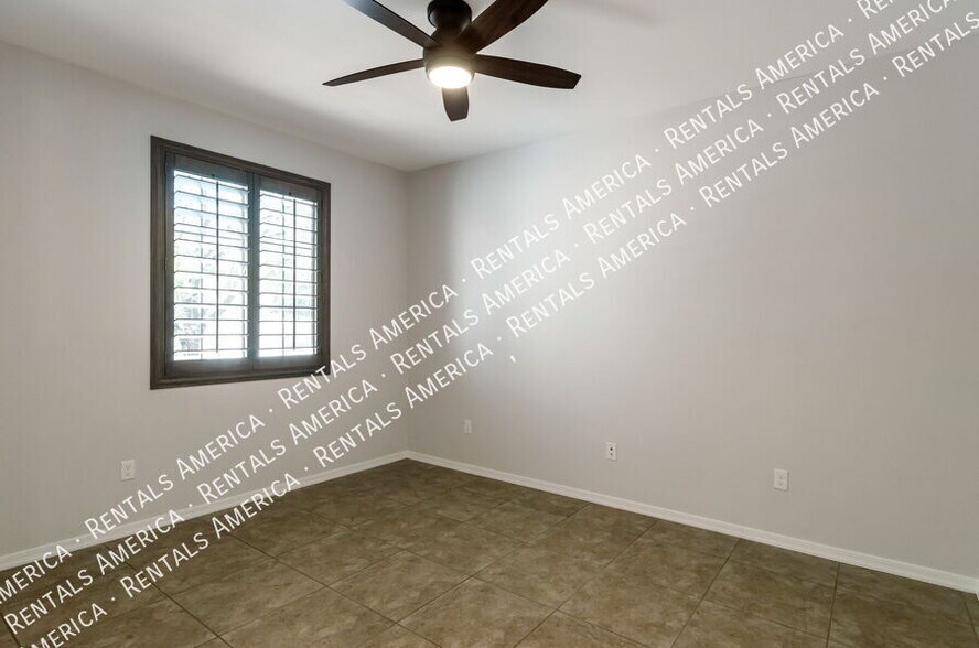 Building Photo - 5768 S Tiger Lily Pl