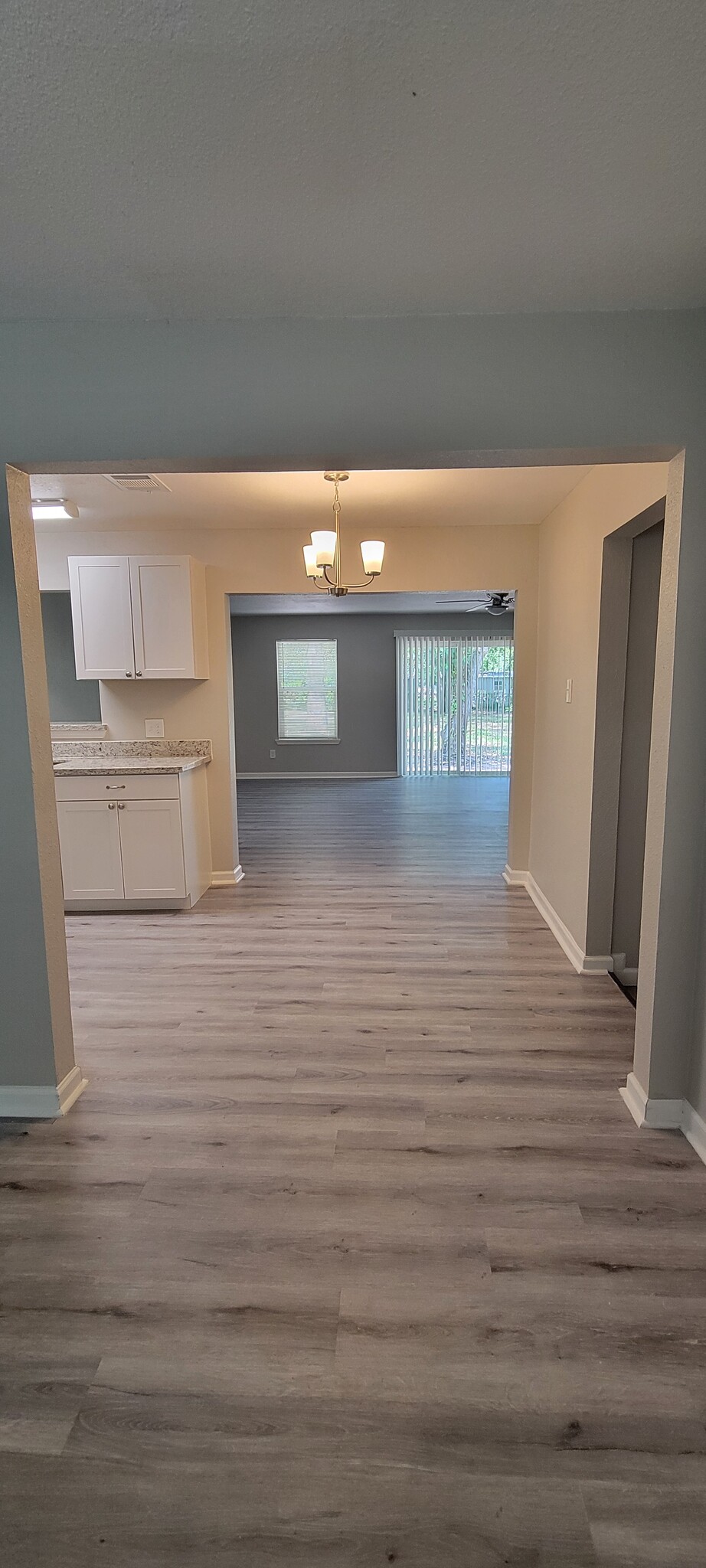 Leading from sunroom to kitchen area - 903 Brockman St