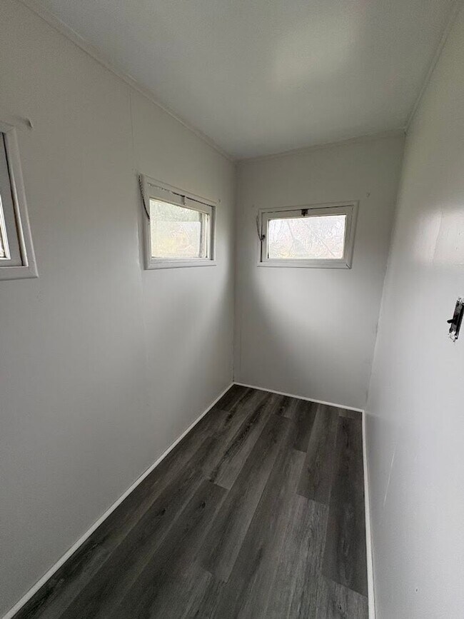 Building Photo - Three bedroom one bathroom 2 story home for rent