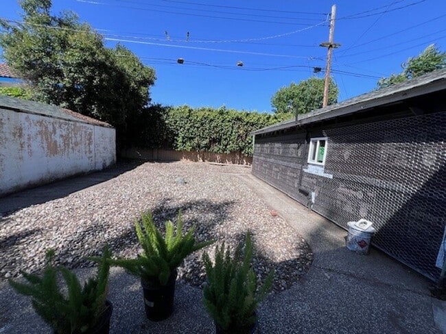 Building Photo - Beautiful Land Park home with fresh paint and new flooring throughout.