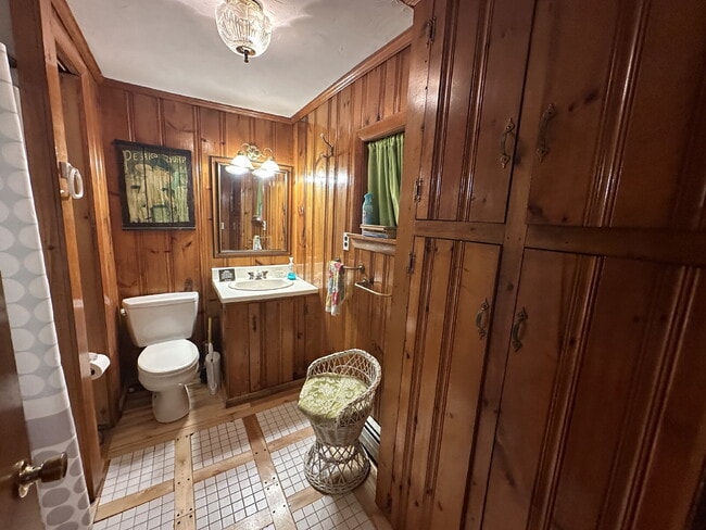 Building Photo - Charming 3BR Waterfront Retreat with Sunroom, Brick Accent & Scenic Lake Views