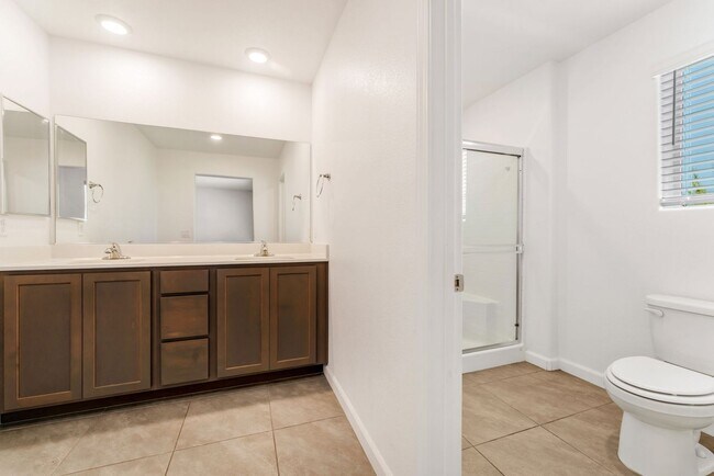 Building Photo - Modern Gated Townhome Living with Resort-Style Community Amenities