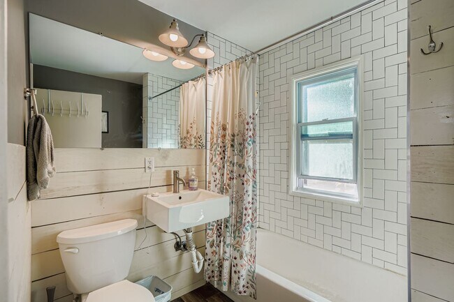 Bathroom with Tub + Shower - 1000 26th Ave NE