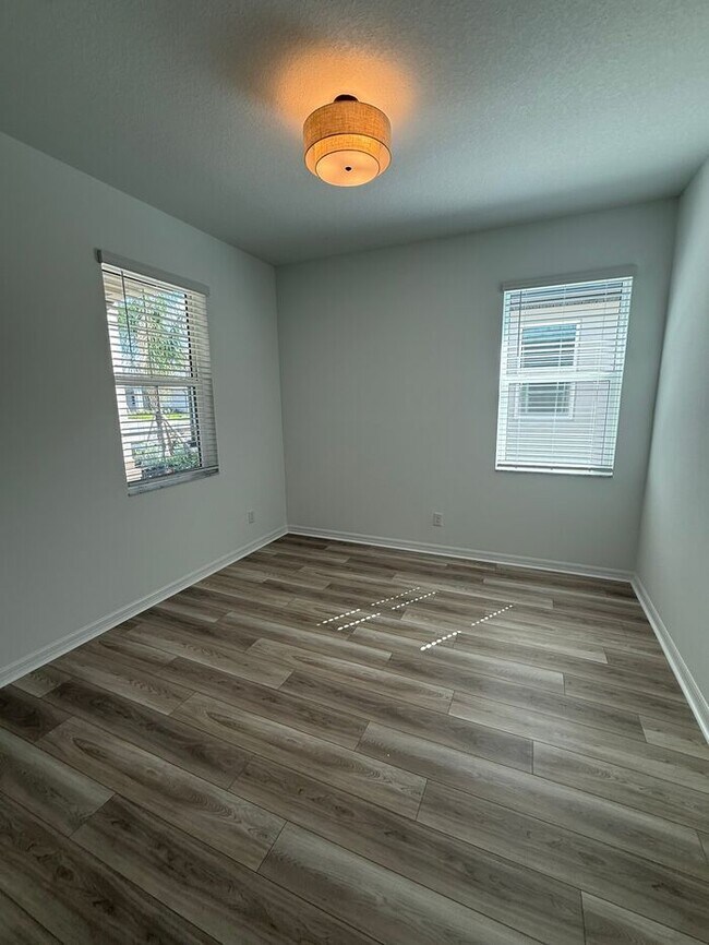 Building Photo - 2BR 2BA Home w/ Quartz Island Kitchen + Pond View Lanai + 2-Car Garage in Lakewood Ranch