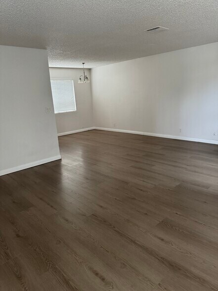 New floors (Living Room/Dining Room) - 502 S Garfield Ave