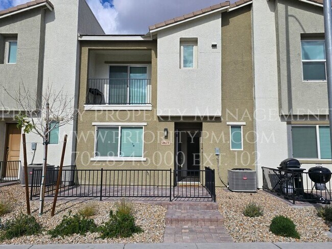 Building Photo - Gated~ 2 Bedroom Townhome w/2 Car Garage~MUST SEE!