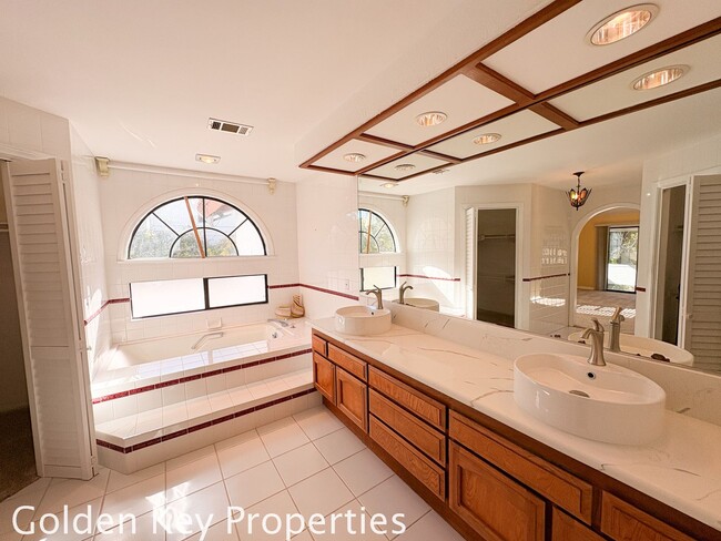 Building Photo - Welcome to this stunning 4-bedroom, 3-bathroom home located in the desirable La Costa neighborhoo...