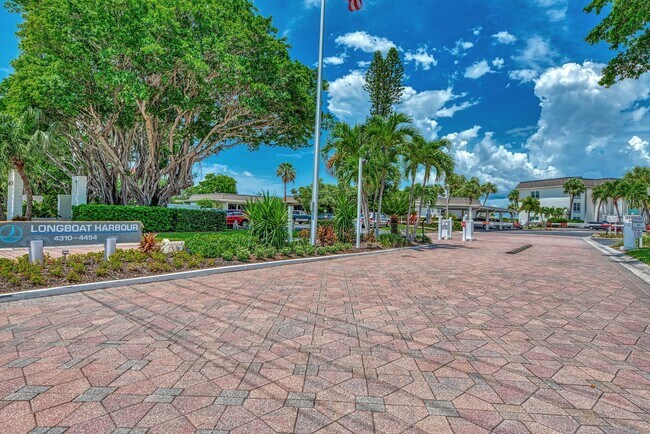 Building Photo - LUXURY LONGBOAT LIVING AT IT’S FINEST! AVA...