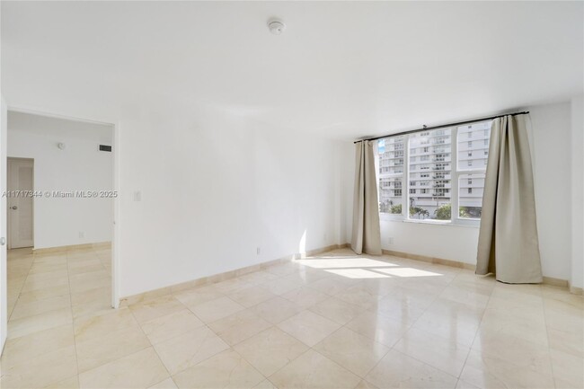 Building Photo - 5600 Collins Ave