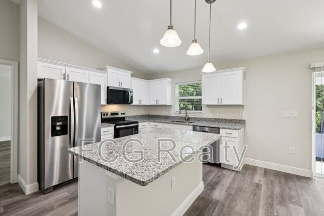 Building Photo - 10675 N Adler Dr