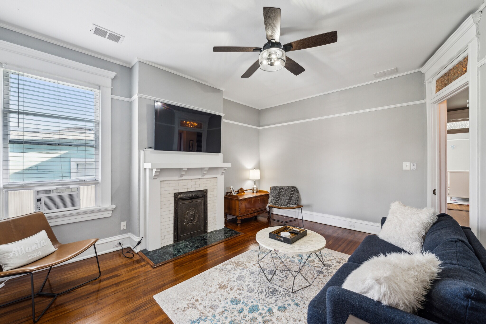 Living room. Sofa, coffee table and tv included if desired - 1118 Colquitt Ave NE