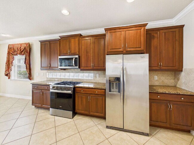 Building Photo - Luxury Lakefront Pool Home in Tesoro - Move-in Ready with Premium Inlcusions