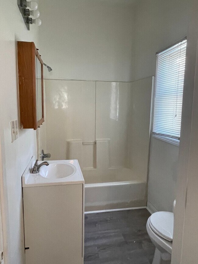 Building Photo - Updated three bedroom two bathroom home in...