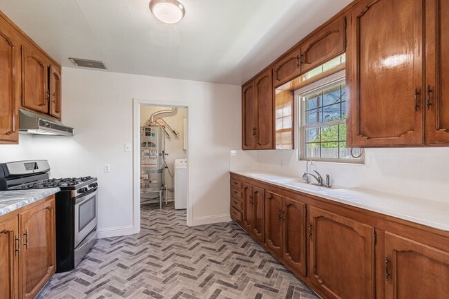 Building Photo - Charming & Updated: Your Perfect Retreat A...