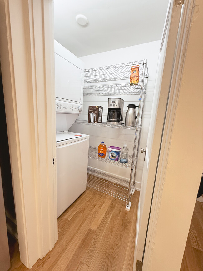 Walk-in pantry features stacked washer and dryer. - 214 Wadsworth St