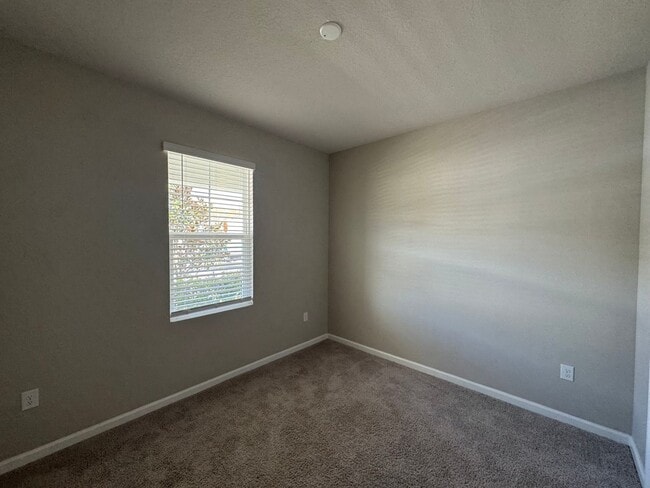 Building Photo - Where Modern Comfort Meets 4BD/3BA Hometown Charm — Your Story Begins in Okahumpka! FULLY-FENCED!...