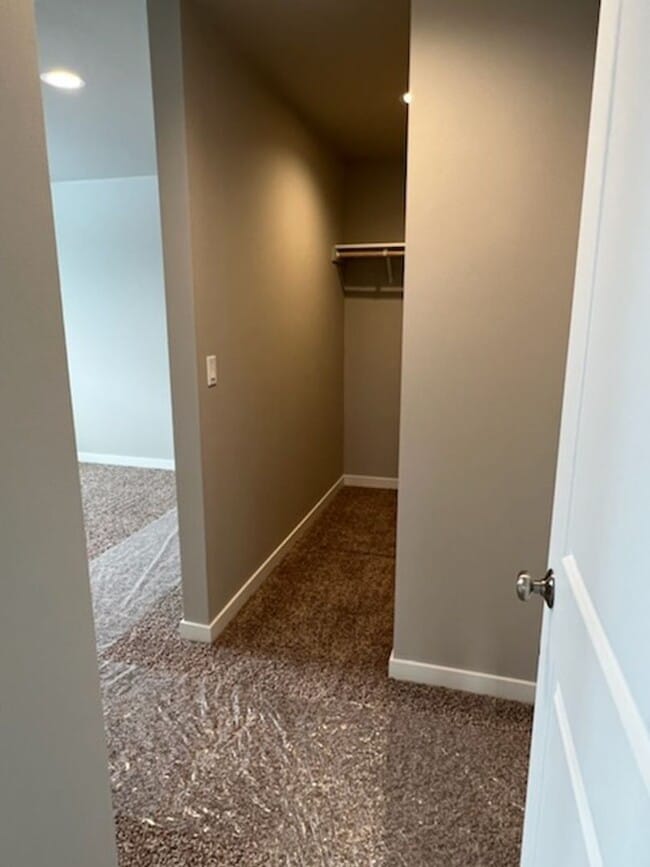 Building Photo - 3 bed/2 bath rambler style home! Attached garage, fenced back yard & A/C!