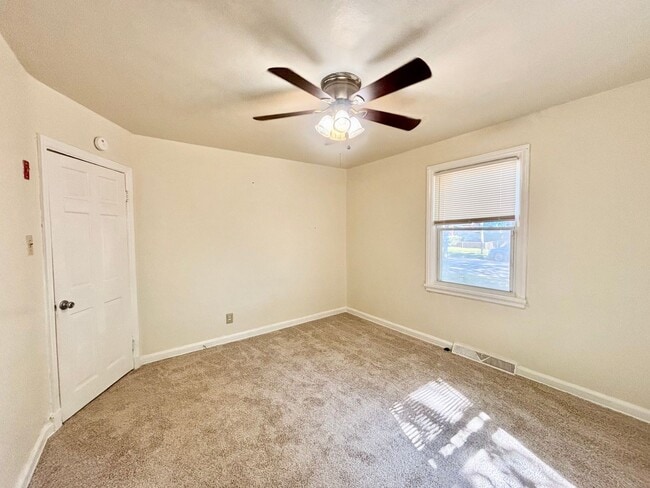 Building Photo - Cozy Home with Private Backyard & Detached...