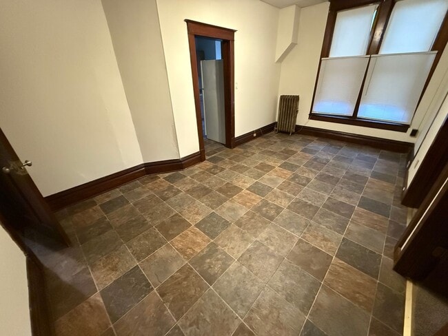 Building Photo - Spacious 4-Bedroom Apartment with Main Street Views