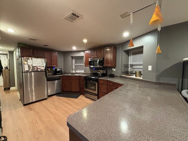 Large kitchen with plenty of counter space - 4871 N Magnolia Ave