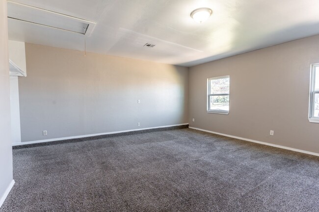 Building Photo - Spacious 4-Bedroom Home with Modern Updates and a Big Yard