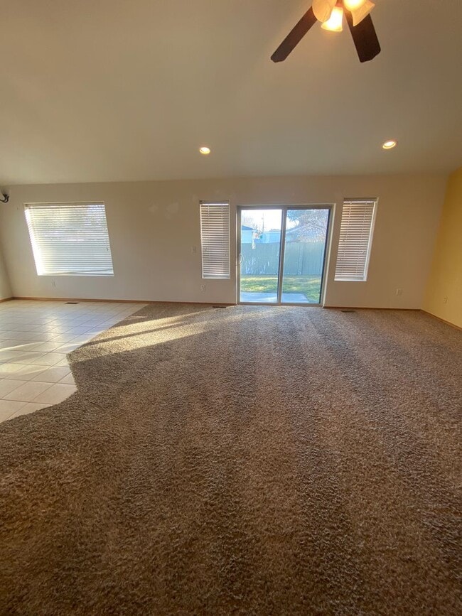 Building Photo - April Rent Free - House with Triple Car Garage