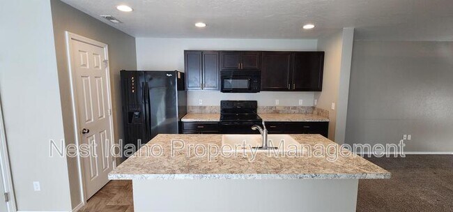 Building Photo - 657 N Manship Ave