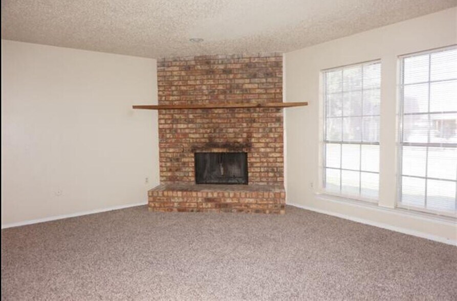 Large oversize fireplace with oversized living room. - 2205 Chase Ct
