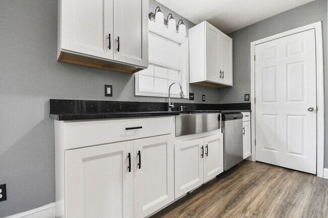 Building Photo - Pet Friendly Three Bedroom with Basement!