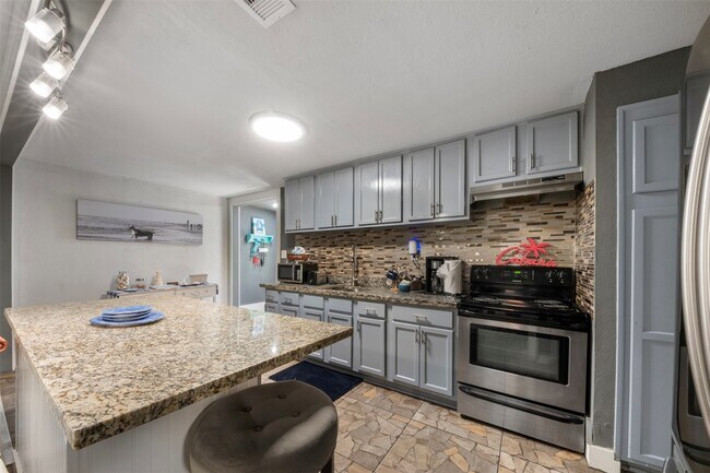 Building Photo - 3218 Ave Q 1/2